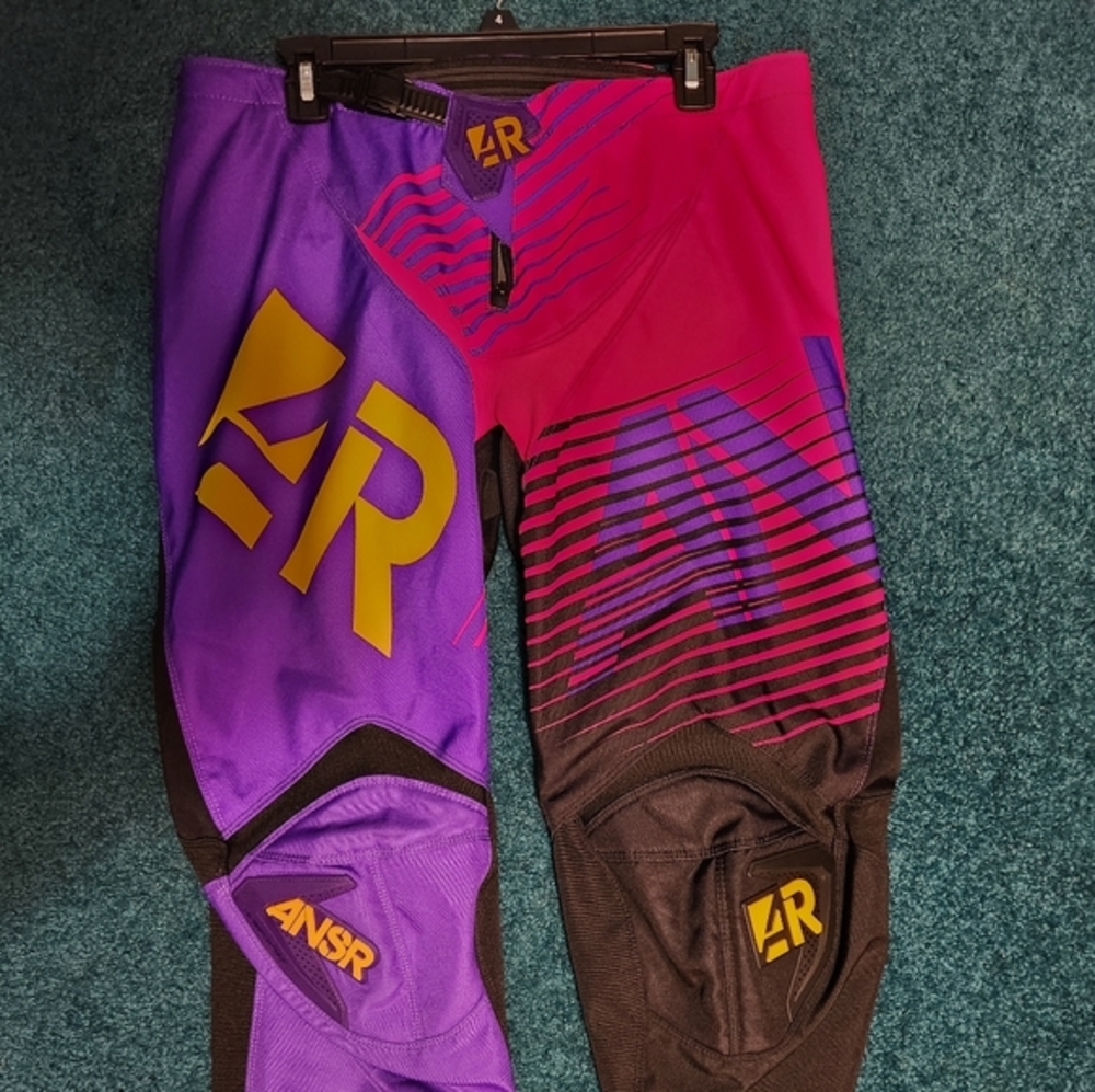 Womens Answer motocross riding pants. Size 14, worn once, pink and purple.